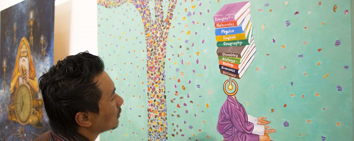 A visitor lost in the wonder of a painting.