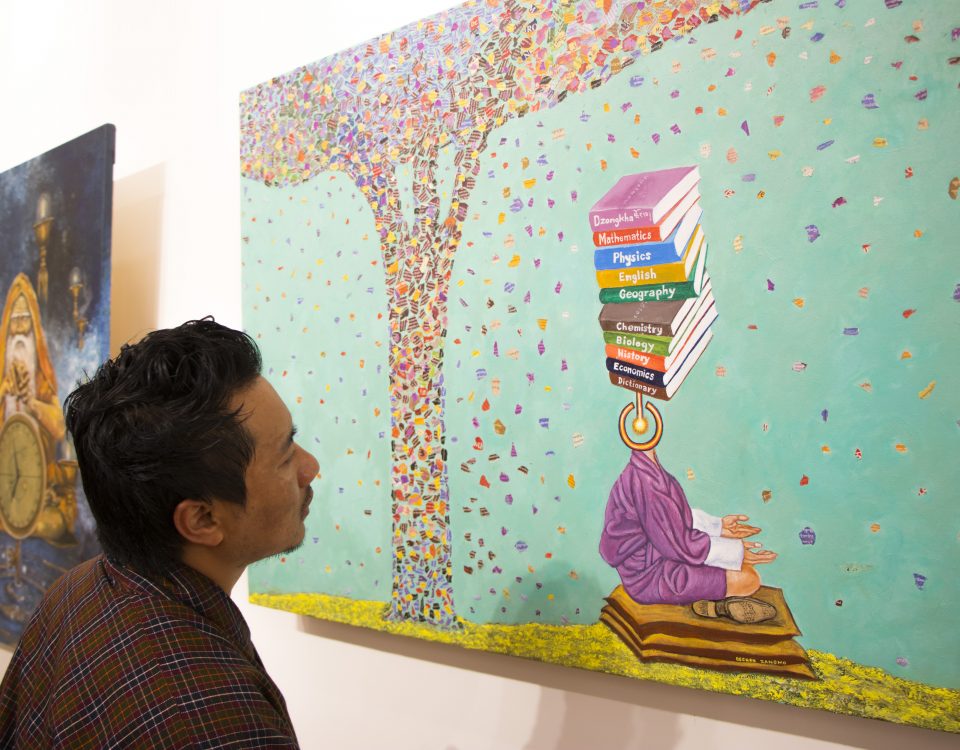 A visitor lost in the wonder of a painting.